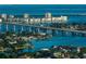 Gorgeous waterfront view of upscale homes, bridges, and sailboats sailing on the calm, blue bay at 3800 Gulf Blvd # Ph, St Petersburg, FL 33706
