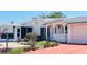 Charming single Gathering home with well-maintained landscaping and inviting curb appeal at 409 Bryn Mawr Is, Bradenton, FL 34207