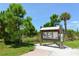 Community information board surrounded by trees, promoting local events and neighborhood information at 409 Bryn Mawr Is, Bradenton, FL 34207