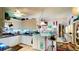Well-lit kitchen featuring white cabinets and an open layout, perfect for entertaining at 409 Bryn Mawr Is, Bradenton, FL 34207
