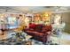 Inviting living room with comfortable furnishings and seamless flow into the dining area at 409 Bryn Mawr Is, Bradenton, FL 34207