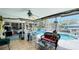 Enclosed patio with nice pool and view of canal at 409 Bryn Mawr Is, Bradenton, FL 34207