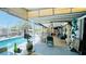 Enclosed patio has nice pool and seating areas at 409 Bryn Mawr Is, Bradenton, FL 34207