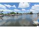 Picturesque waterfront view with boats docked, offering a tranquil setting and convenient marina access at 409 Bryn Mawr Is, Bradenton, FL 34207