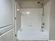 Clean, white tiled bathtub and shower combo, perfect for relaxation at 4142 Central Sarasota Pkwy # 1423, Sarasota, FL 34238