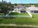Aerial view of the home featuring a large fenced backyard at 4429 67Th E St, Bradenton, FL 34203