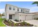 Charming two-story home featuring a neatly landscaped front yard and a spacious two-car garage at 4429 67Th E St, Bradenton, FL 34203