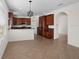 Kitchen and breakfast area with stainless steel appliances, granite counters, and tile flooring at 4429 67Th E St, Bradenton, FL 34203