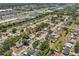 Neighborhood aerial shot showcasing a variety of homes and tree-lined streets in a residential area at 4468 Maraldo Ave, North Port, FL 34287