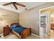 Bedroom featuring neutral walls, tiled floors, a twin bed and closet at 4468 Maraldo Ave, North Port, FL 34287