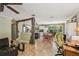 Open-concept living area showcasing decorative rock detail and tiled flooring at 4468 Maraldo Ave, North Port, FL 34287