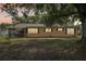 Single-story home exterior featuring a screened-in porch perfect for outdoor living and relaxing at 4468 Maraldo Ave, North Port, FL 34287
