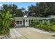Cozy home with a charming front yard, walkway, and well-maintained landscaping at 4695 86Th N Ave, Pinellas Park, FL 33782