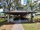 A community pavilion with picnic tables and barbecue grills offering a space for gatherings at 4695 86Th N Ave, Pinellas Park, FL 33782