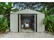 Well-organized shed interior, offering practical storage solutions, ideal for gardening tools and equipment at 4695 86Th N Ave, Pinellas Park, FL 33782