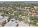 Scenic aerial view of the neighborhood, showcasing lush greenery and the waterways of the area at 5039 Kestral Park Dr # 67, Sarasota, FL 34231