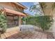 Private outdoor patio perfect for dining al fresco with views of the landscaped yard at 5039 Kestral Park Dr # 67, Sarasota, FL 34231
