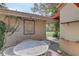 Private outdoor patio perfect for dining al fresco, including a beautiful tile fountain at 5039 Kestral Park Dr # 67, Sarasota, FL 34231