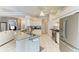 Bright kitchen boasting granite counters, stainless appliances and a view to the connected living area at 5386 Creekside Trl, Sarasota, FL 34243