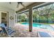 Covered lanai provides a screened view of the beautiful backyard pool area at 5386 Creekside Trl, Sarasota, FL 34243