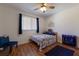 Bright bedroom with stylish furniture, ceiling fan and luxury vinyl flooring at 5403 2Nd W Ave, Bradenton, FL 34209