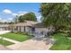 One-story home featuring well-maintained landscaping, and an inviting front porch, perfect for a comfortable lifestyle at 5403 2Nd W Ave, Bradenton, FL 34209