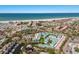 Aerial view of the community, perfectly located near beaches, shopping, and waterfront amenities at 5623 Midnight Pass Rd # 615, Sarasota, FL 34242