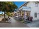 Charming ice cream shop exterior with purple accents, offering a sweet treat in a quaint setting at 5623 Midnight Pass Rd # 615, Sarasota, FL 34242