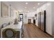 Modern kitchen and dining area featuring stainless steel appliances at 5623 Midnight Pass Rd # 615, Sarasota, FL 34242