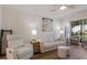 Bright living room featuring hardwood floors, stylish furnishings, and natural light at 5623 Midnight Pass Rd # 615, Sarasota, FL 34242