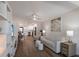 Open floor plan with living room, dining area, and updated kitchen at 5623 Midnight Pass Rd # 615, Sarasota, FL 34242
