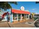The Lobster Pot seafood restaurant with a red awning, featuring fresh seafood, steaks, and chops at 5623 Midnight Pass Rd # 615, Sarasota, FL 34242