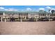 Exterior view of condo's parking with ample covered parking spaces and well-maintained brick driveway at 5623 Midnight Pass Rd # 615, Sarasota, FL 34242