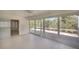Bright sunroom with access to the patio, offering seamless indoor-outdoor living at 5812 Garden Lakes Fern, Bradenton, FL 34203