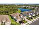 Stunning home with well-maintained landscaping and a beautiful lake view, perfect for serene living at 5816 Mezzana Run, Palmetto, FL 34221