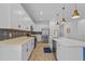 Gourmet kitchen showcases stainless appliances, spacious counters, and island with seating, perfect for entertaining at 5816 Mezzana Run, Palmetto, FL 34221