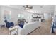 Open-concept living room seamlessly connects to the kitchen and dining area at 5816 Mezzana Run, Palmetto, FL 34221