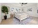 Serene bedroom with natural light, featuring hardwood floors and a calming color palette at 5900 6Th S Way, St Petersburg, FL 33705
