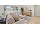 Comfortable living room with large windows and stylish accents, showcasing a cozy atmosphere at 5900 6Th S Way, St Petersburg, FL 33705