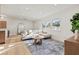 Bright living room featuring hardwood floors and stylish furnishings, creating a welcoming space at 5900 6Th S Way, St Petersburg, FL 33705