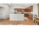 An eat in kitchen with stainless steel appliances, wood cabinets, and tile backsplash at 5902 106Th E Ter, Parrish, FL 34219