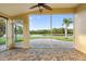 Screened lanai with brick flooring and great views of lake and tropical backyard at 5902 106Th E Ter, Parrish, FL 34219