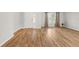 Spacious living room featuring wood floors, neutral paint and natural light at 5902 106Th E Ter, Parrish, FL 34219