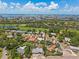 Aerial view showing the property's location in a residential neighborhood near a golf course and waterfront at 5916 Gulfport S Blvd, Gulfport, FL 33707