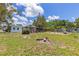 Expansive backyard with a large, grassy area, providing ample space for recreation and landscaping at 5916 Gulfport S Blvd, Gulfport, FL 33707