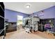 Fun ' bedroom with a bunk bed, desk, and vibrant purple walls at 6104 Plamendon Ave, North Port, FL 34291