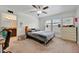 Bright bedroom featuring a bed and a window with natural light at 6104 Plamendon Ave, North Port, FL 34291