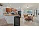 Bright kitchen featuring updated appliances and an eat-in area at 6104 Plamendon Ave, North Port, FL 34291