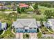 Aerial view of townhomes overlooking the beautiful golf course and tranquil pond at 6546 Fairway Gardens Dr # 6546, Bradenton, FL 34203