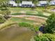 Gorgeous aerial view of condos near pond and golf course at 6546 Fairway Gardens Dr # 6546, Bradenton, FL 34203